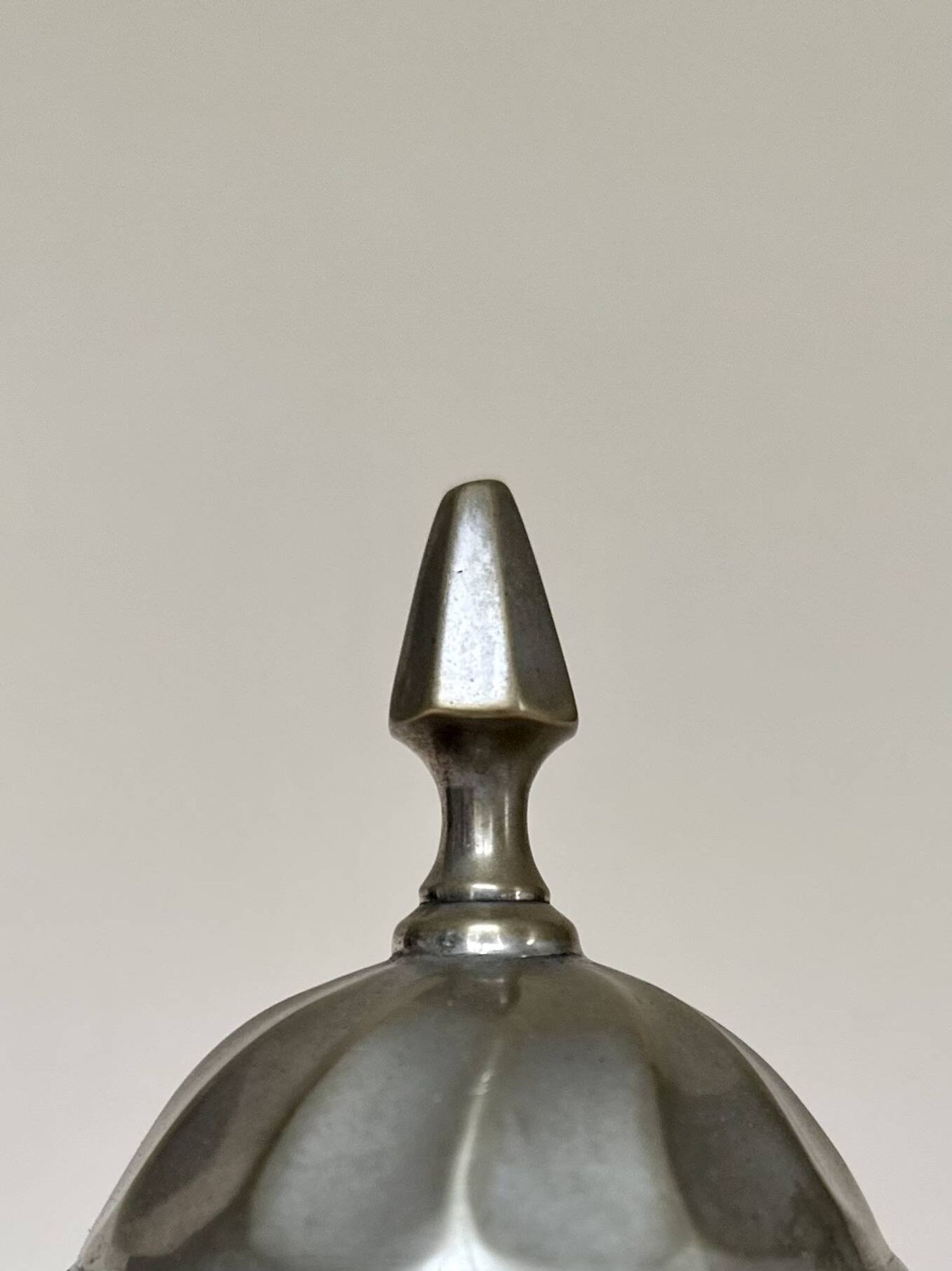 Silver-plated metal teapot with fluted body in Art Deco style