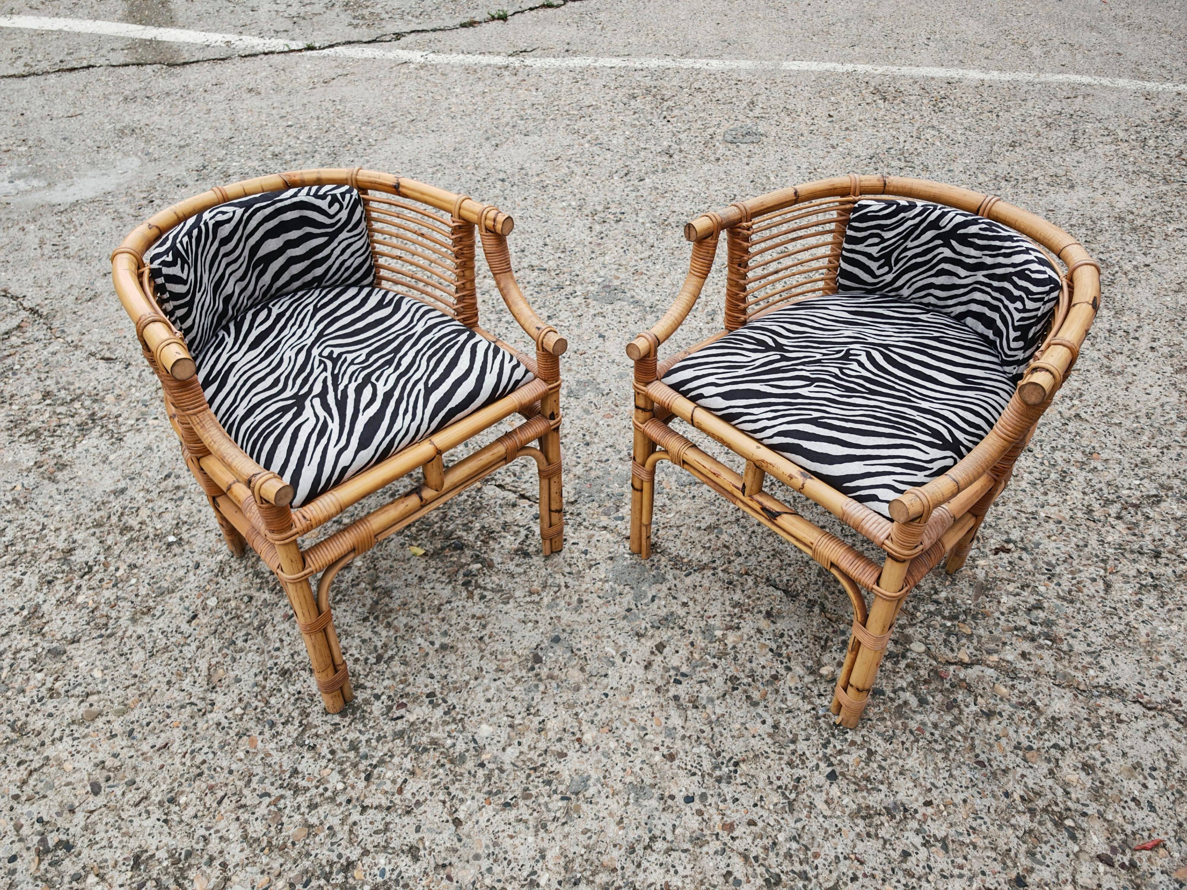 Pair of Mid Century armchairs, horseshoe shape, Italy 1950s.