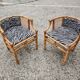 Pair of Mid Century armchairs, horseshoe shape, Italy 1950s.