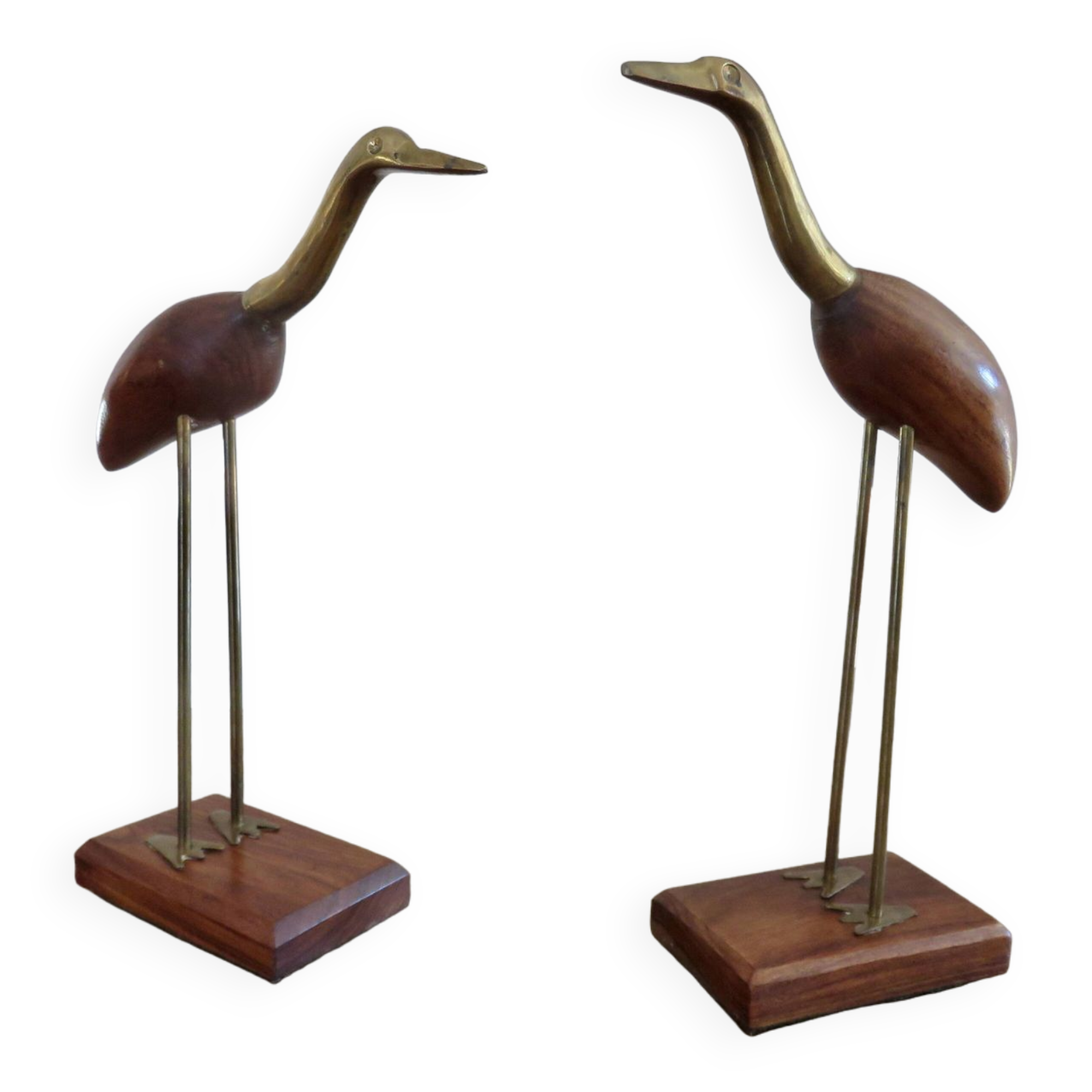 Pair of teak and brass herons from the 70s