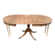 Round extendable dining table Regency central leg stripped mahogany 1960