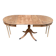 Round extendable dining table Regency central leg stripped mahogany 1960