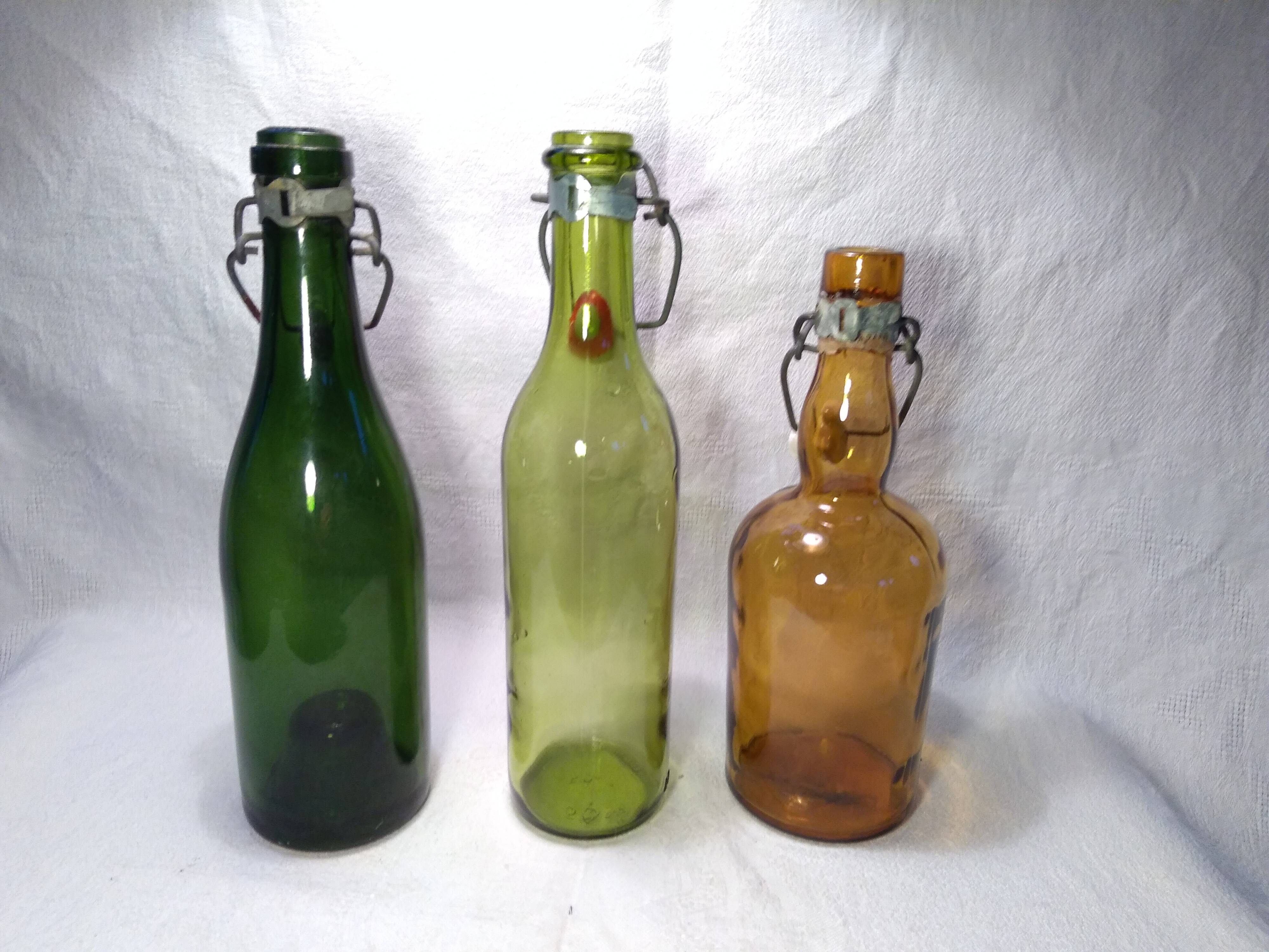 Trio old brewery bottles