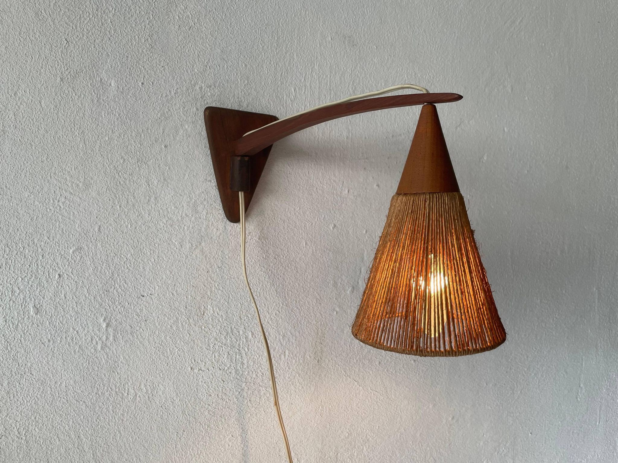Teak wall lamp with natural ropes by Ib Fabiansen for Fog & Mørup, 1960s, Denmark.