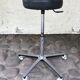 Stool on metal stand in star on wheels sitting round padded skaï bluish