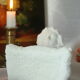 Limestone bust young girl who reads
