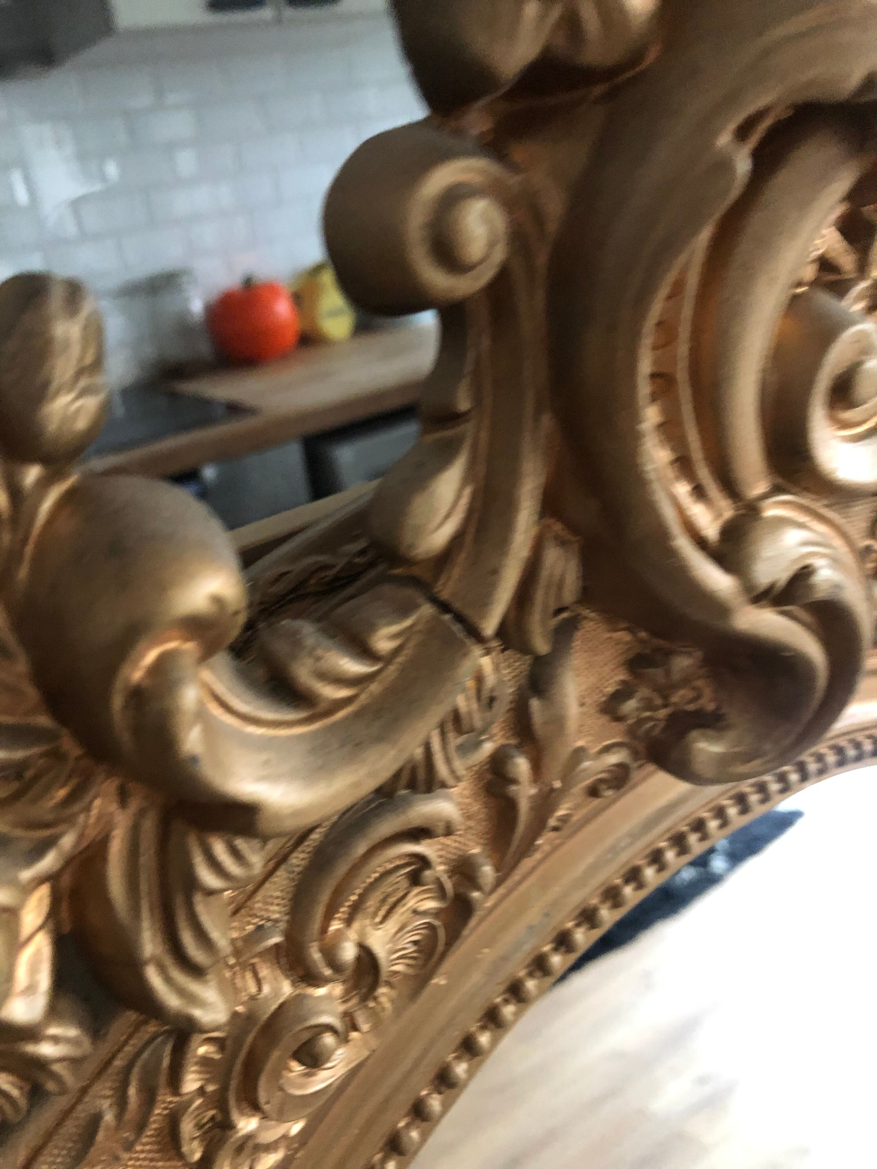 Gilded mirror with pediment XIXth century, 86x136