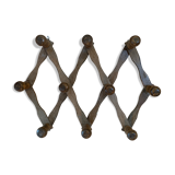 Accordion wall coat holder