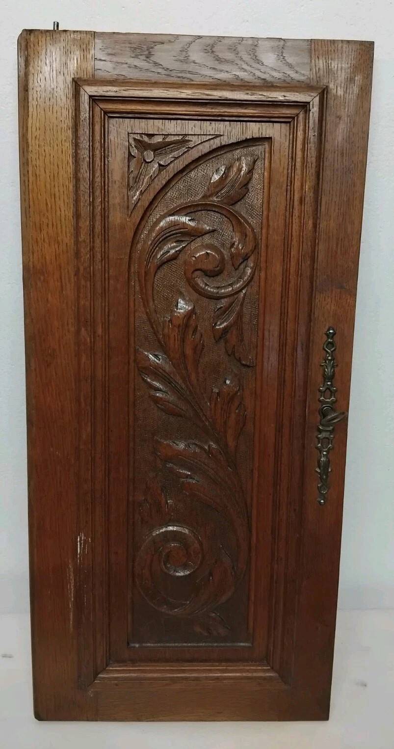Pair of antique carved oak wood door panels