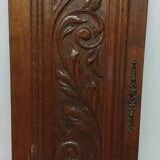 Paire d'anciens panneaux de porte en bois chêne sculpté