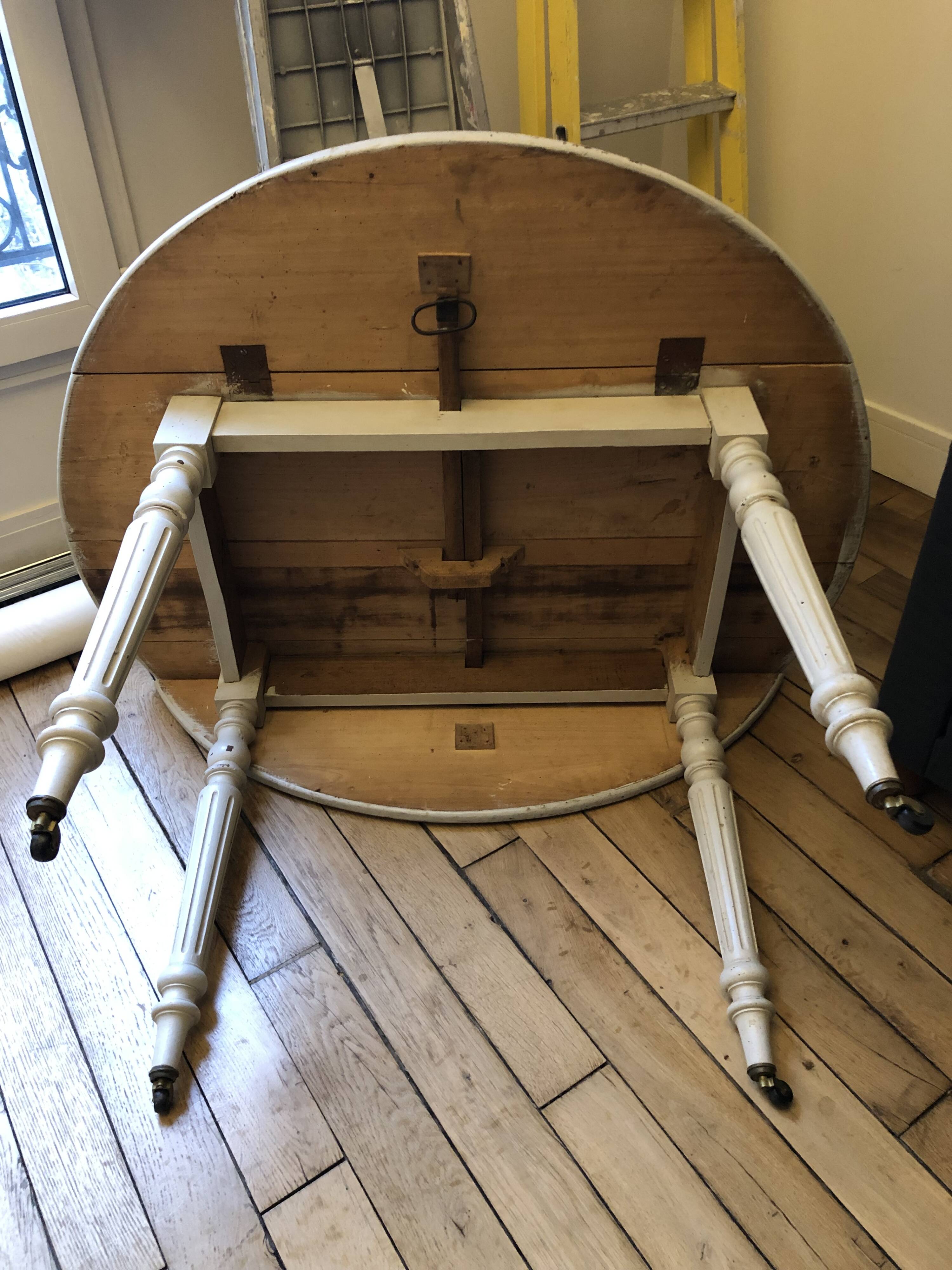 Antique folding round table