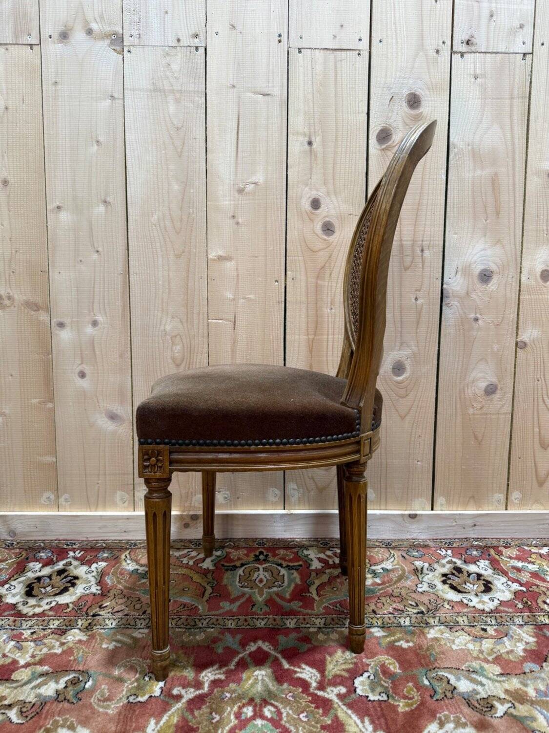 Set of 6 Louis XVI medallion chairs in wood and caning.