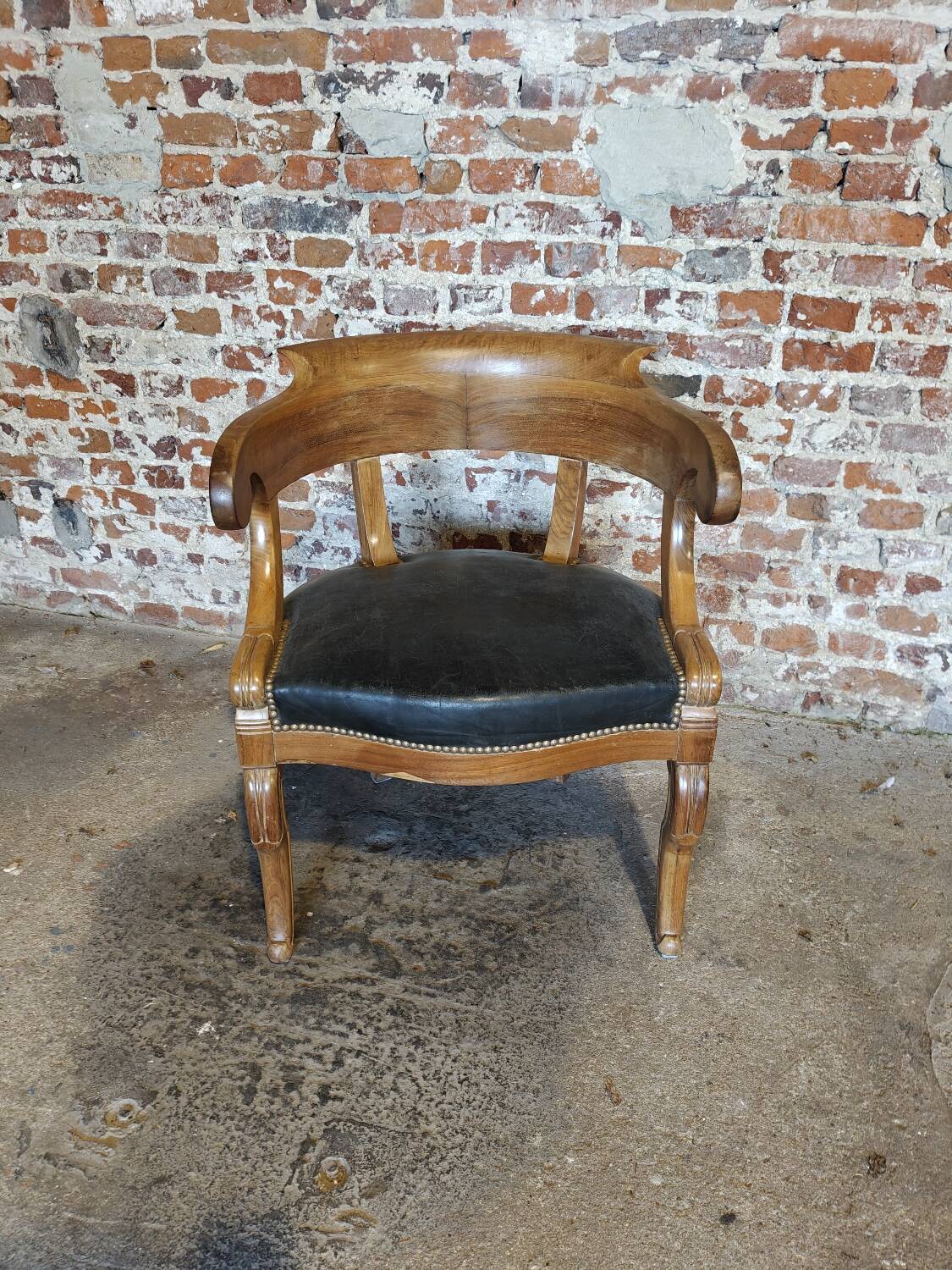 Antique Empire armchair in wood and black leather – gondola backrest