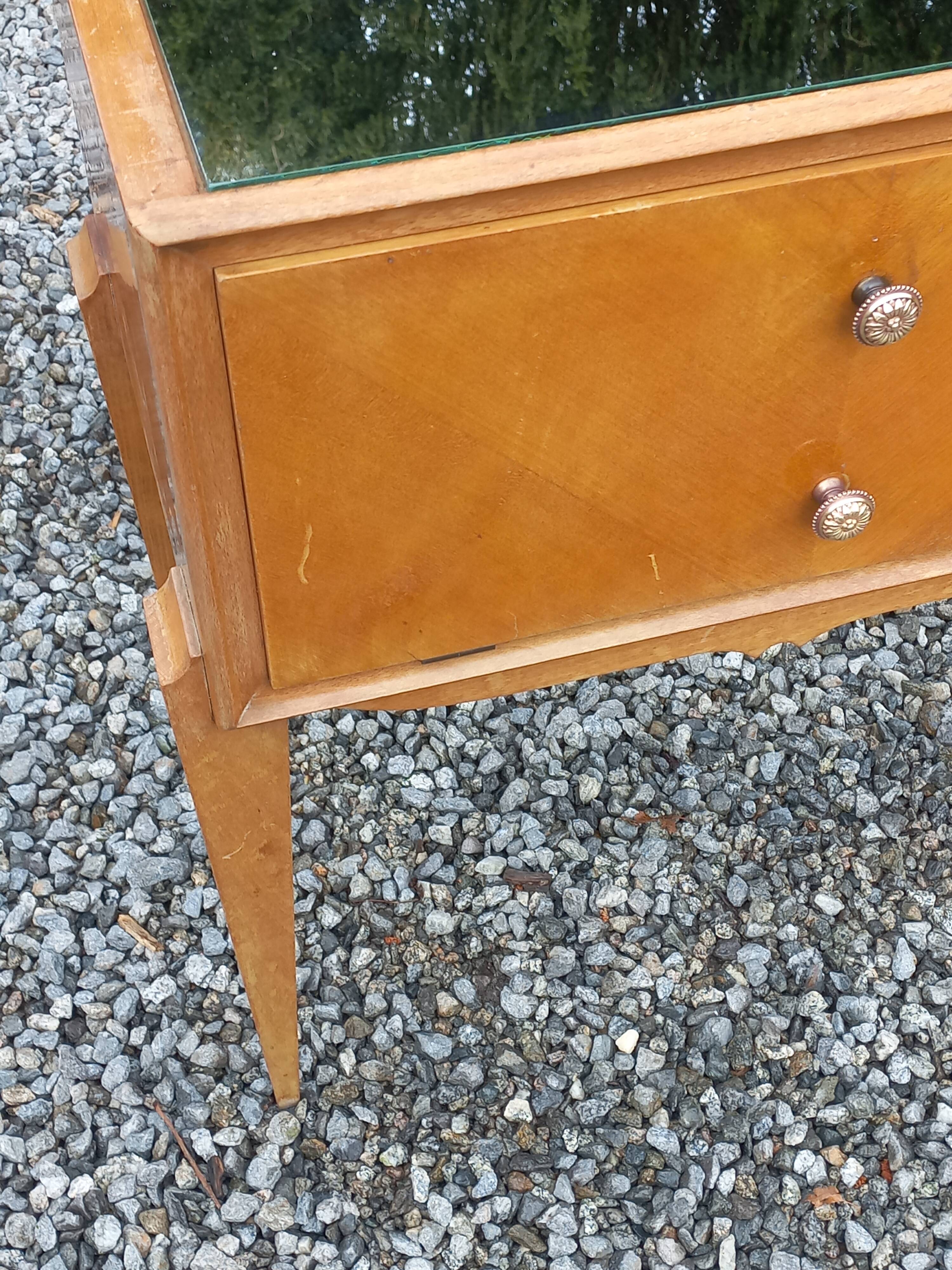 Vintage pair of bedside tables from the 1950s in sycamore and a mirror.