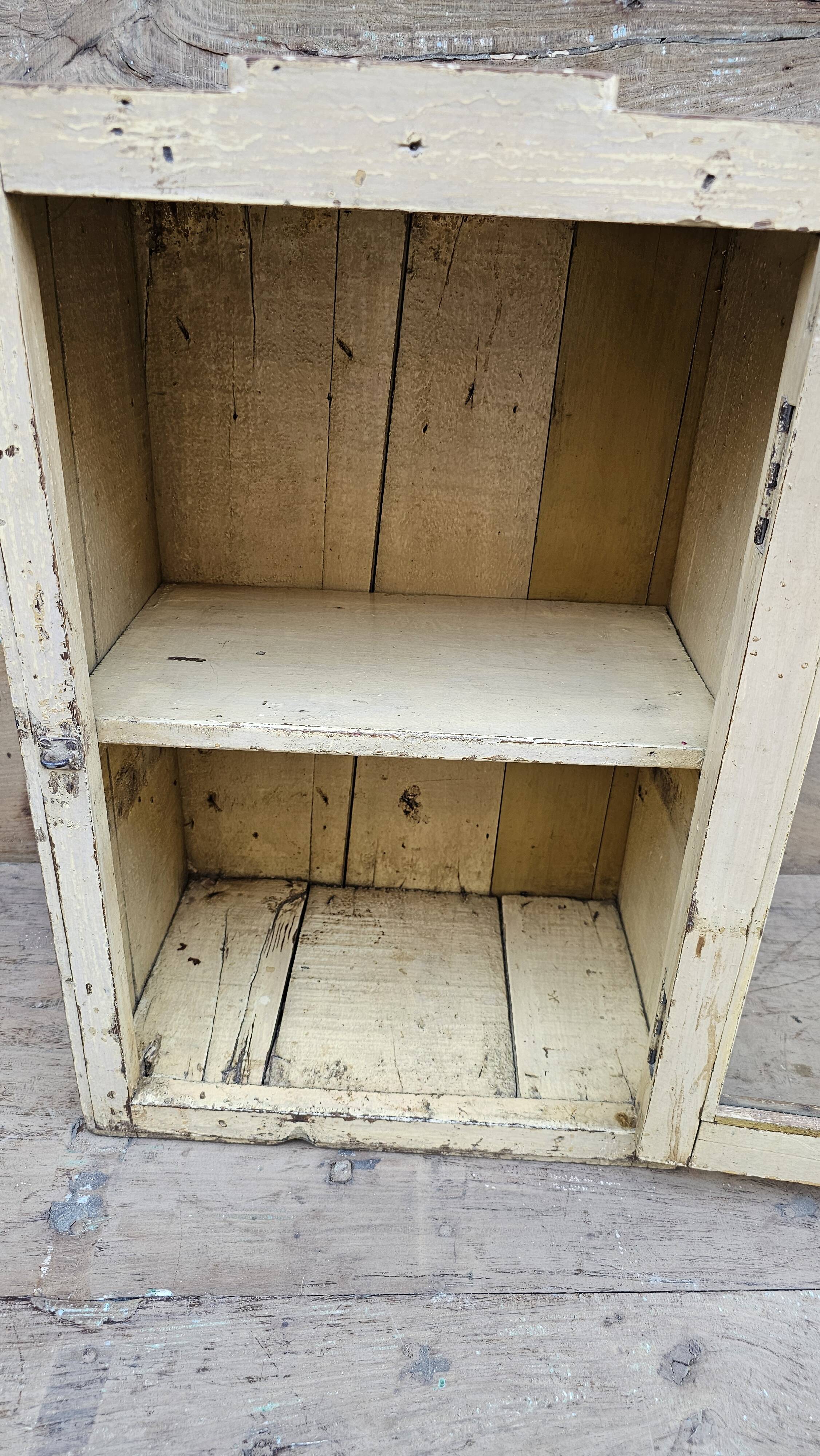Antique Art Deco wall display cabinet in Burmese teak.
