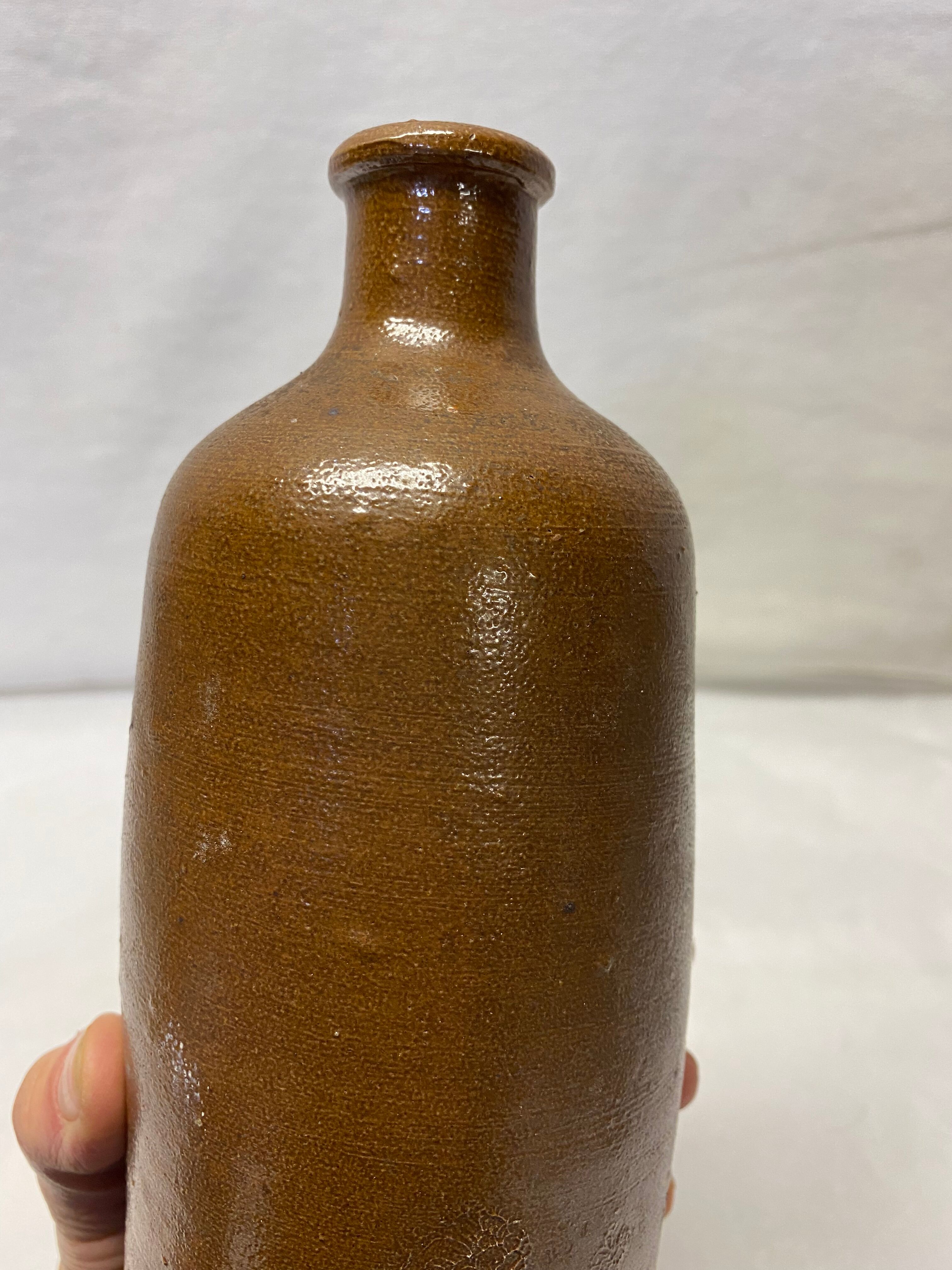 Vintage brown stoneware bottle