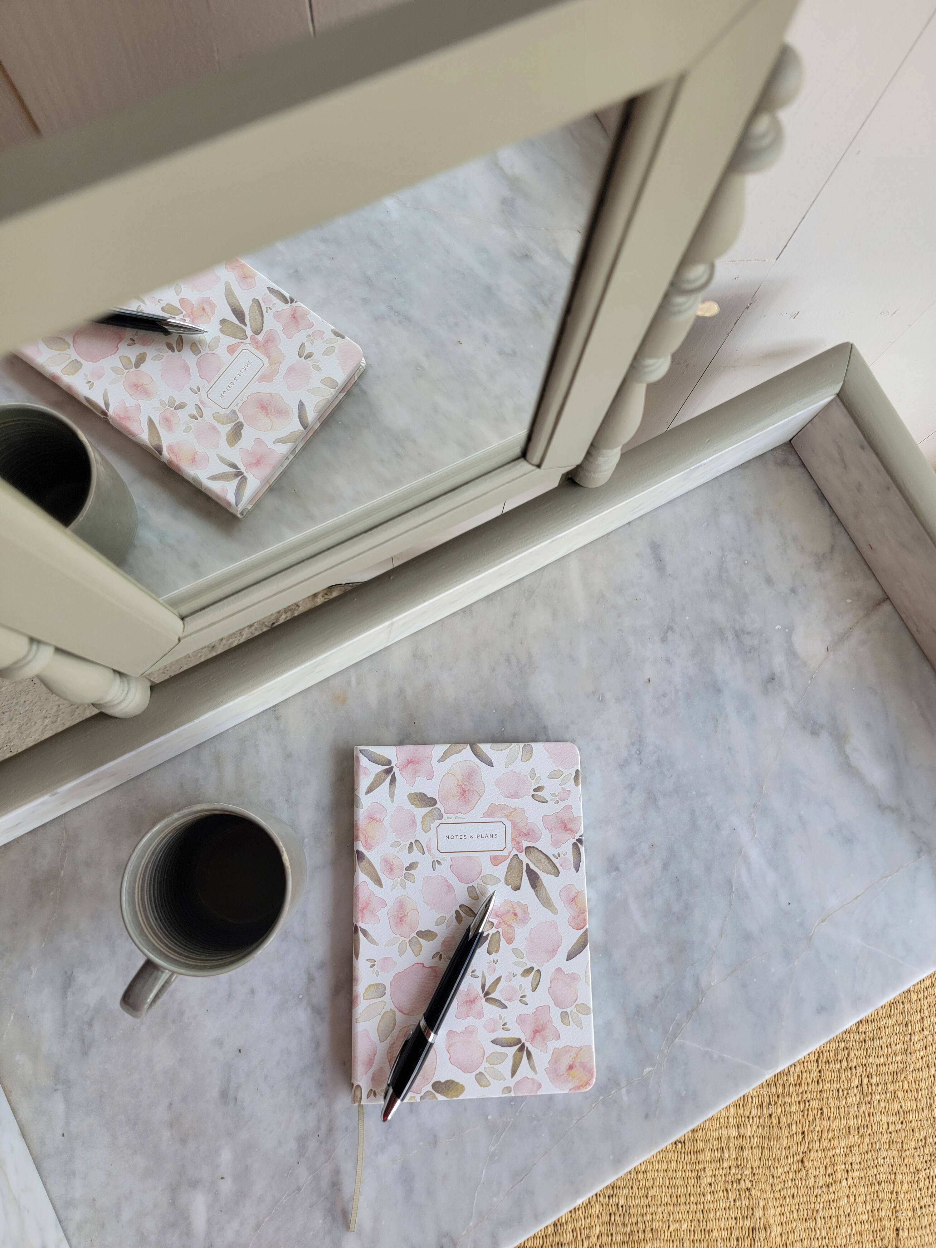 Antique wooden dressing table with marble top and mirror.