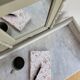 Antique wooden dressing table with marble top and mirror.