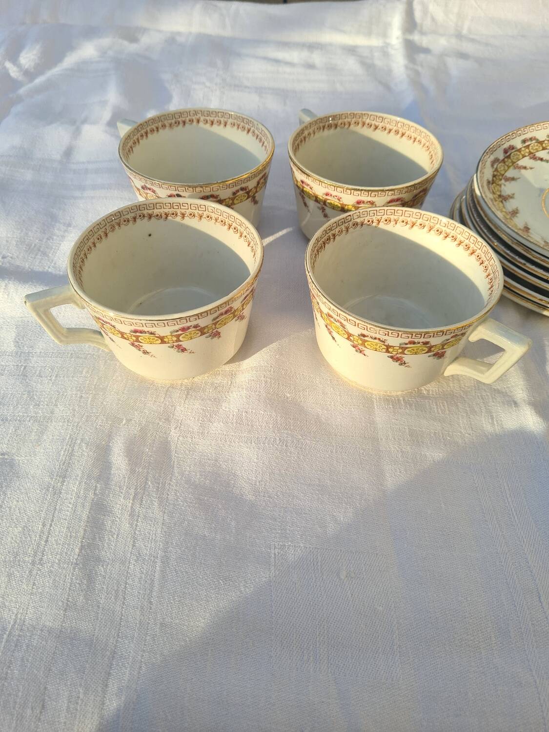 Gien opaque porcelain cups from the early 20th century