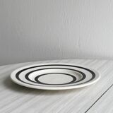 Ceramic plate with black round patterns