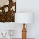 bottle lamp covered with wicker, white drum lampshade, 70s