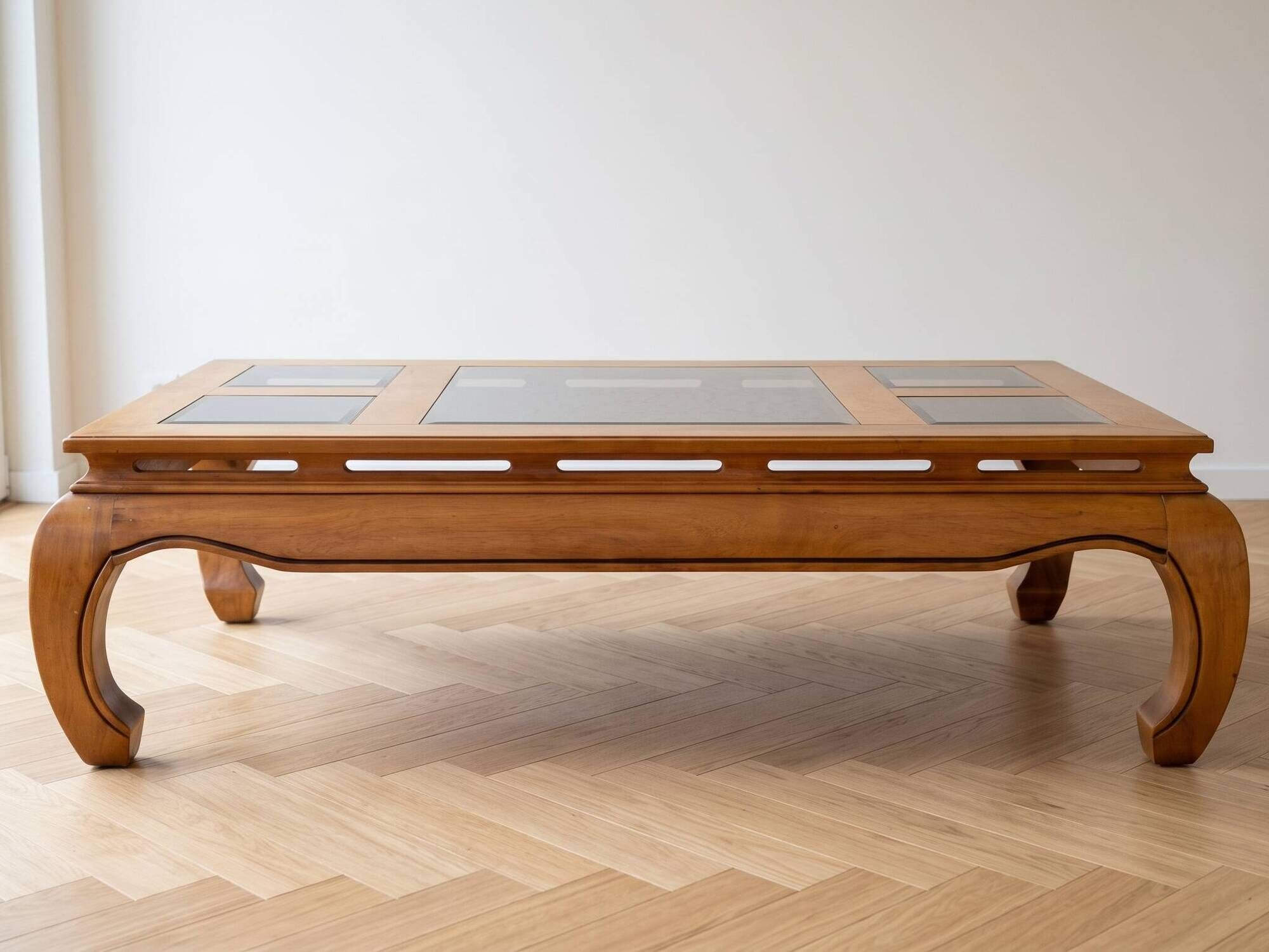 Coffee table in solid cherry wood with glass tops.
