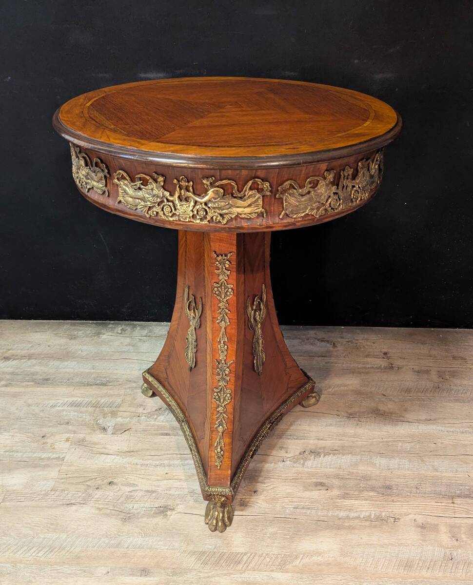 Circular gueridon in marquetry and bronze, Empire style