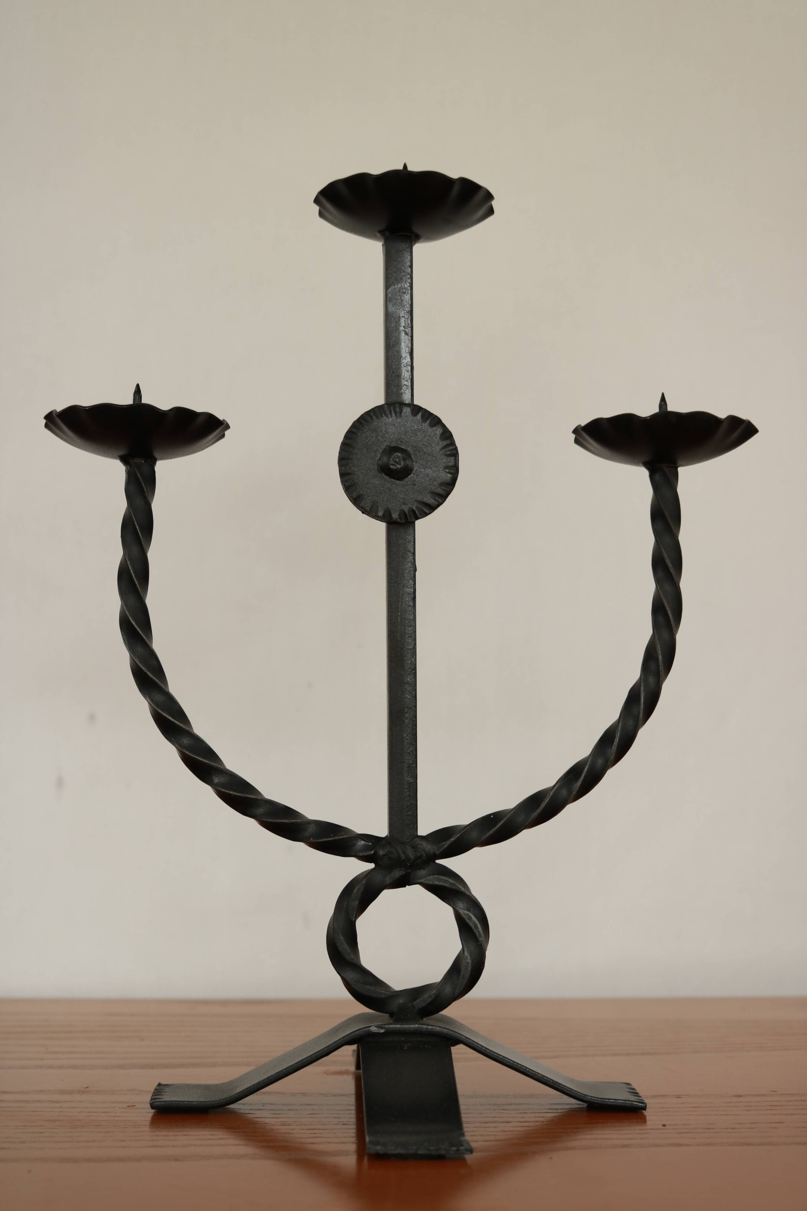 Brutalist style wrought iron candlesticks