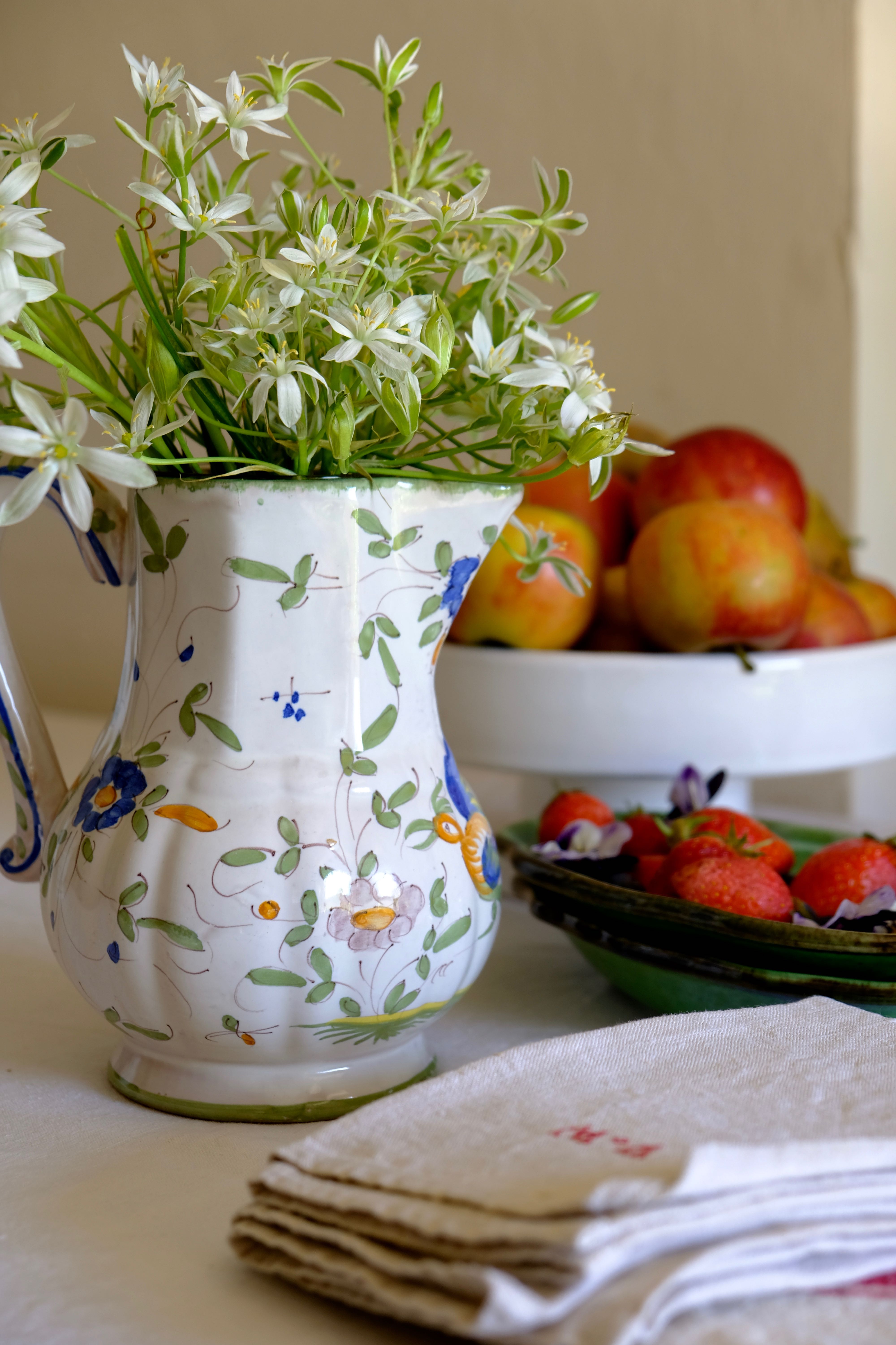 Painted Moustiers earthenware pitcher