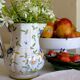 Painted Moustiers earthenware pitcher
