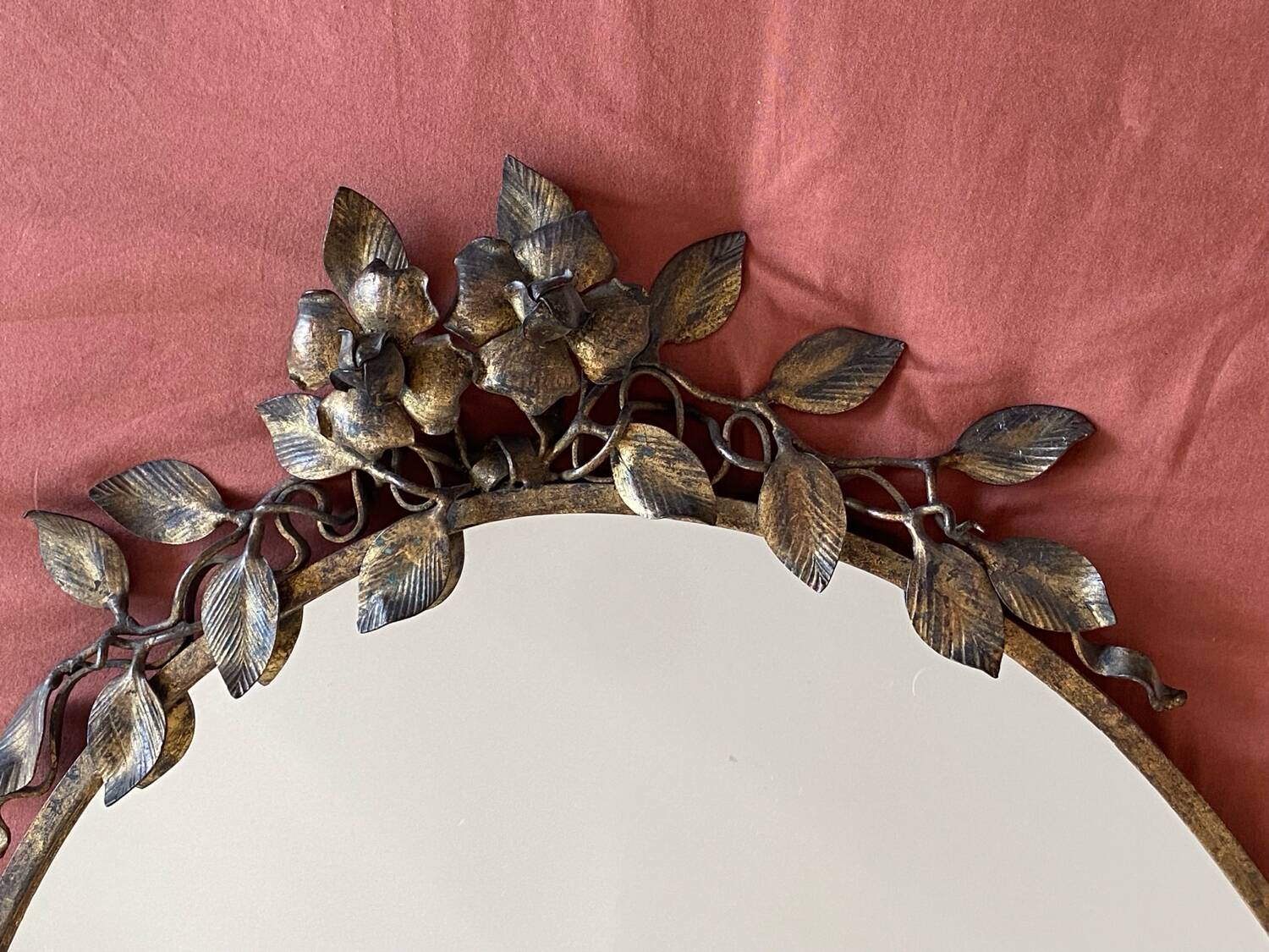 Old bronze frame mirror