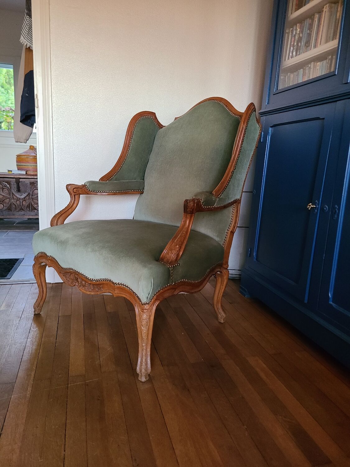Vintage Louis XV style wing chair, light green velvet
