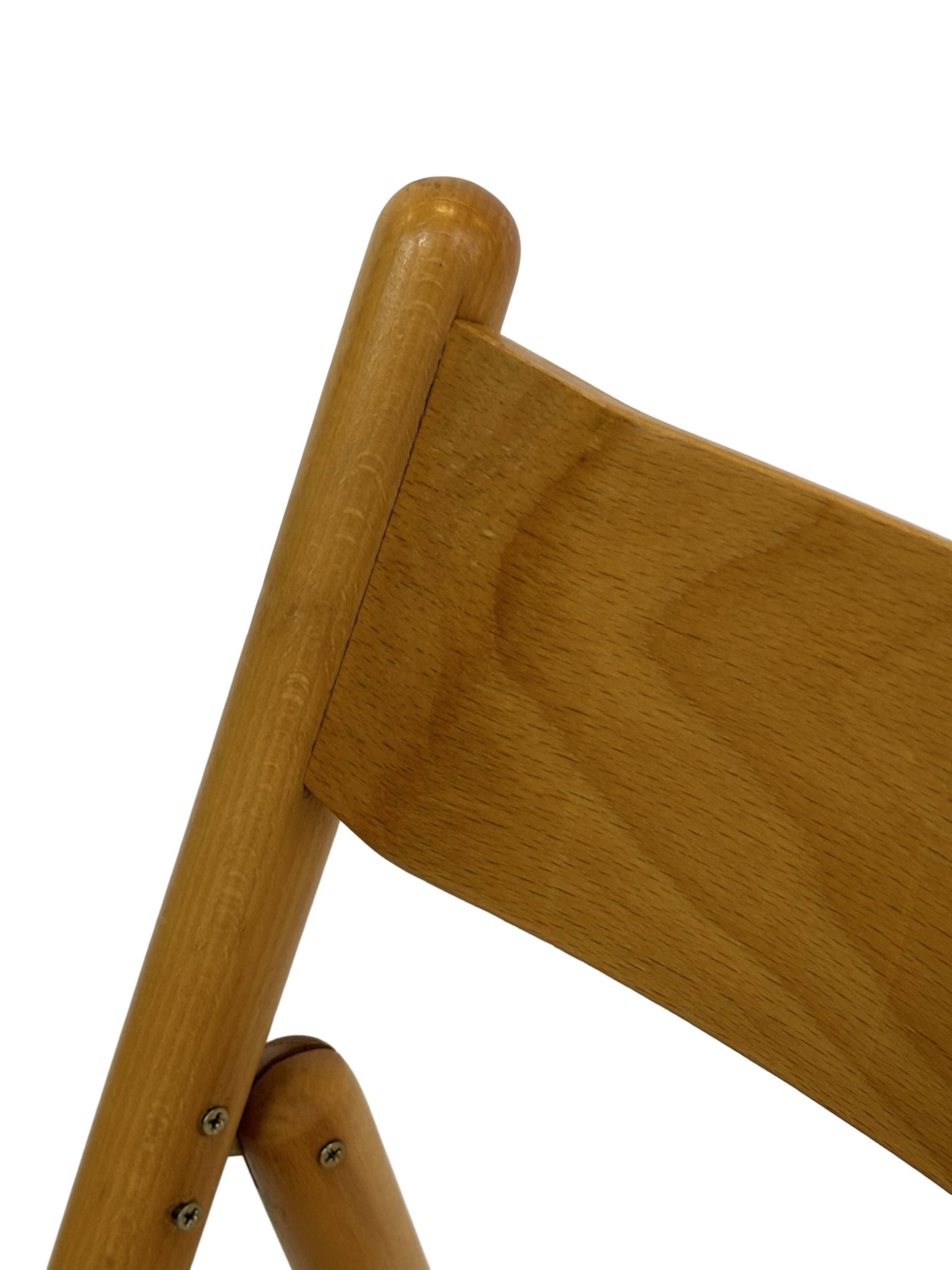 Vintage wooden folding chair with rattan seat 80s minimalist design