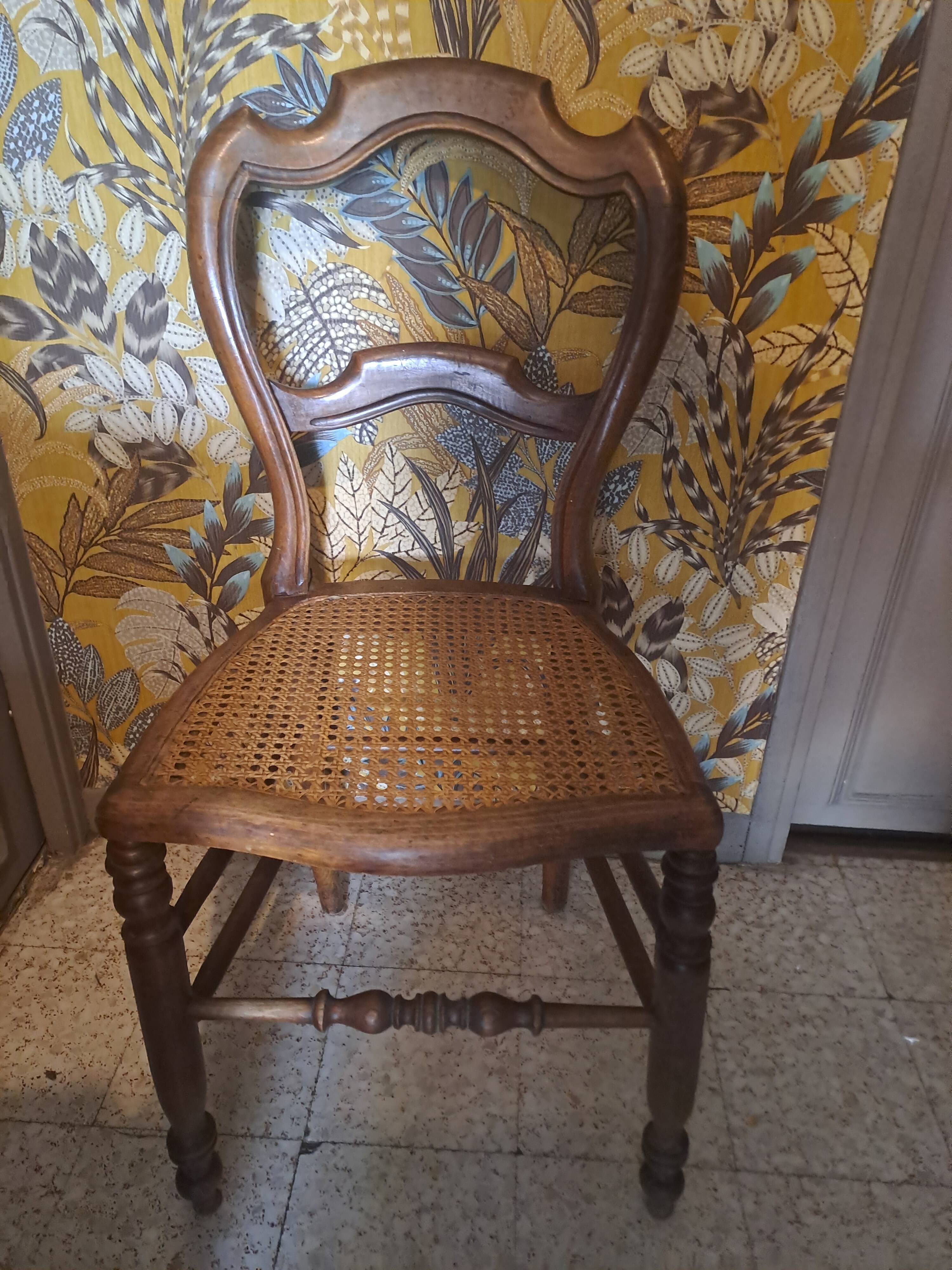 Pair of 1950s light wood bistro chairs with cane seats