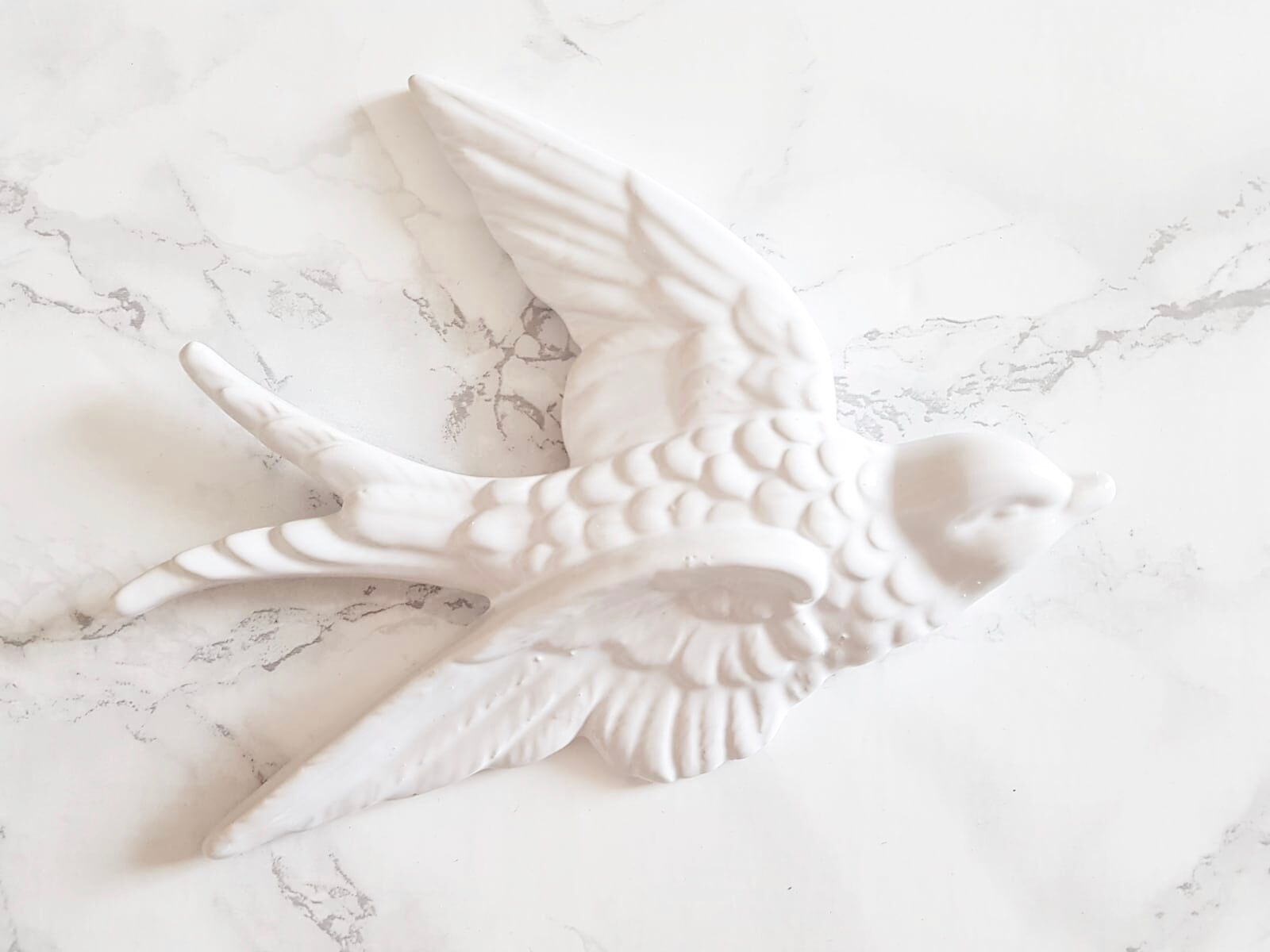 Set of three swallows in white earthenware