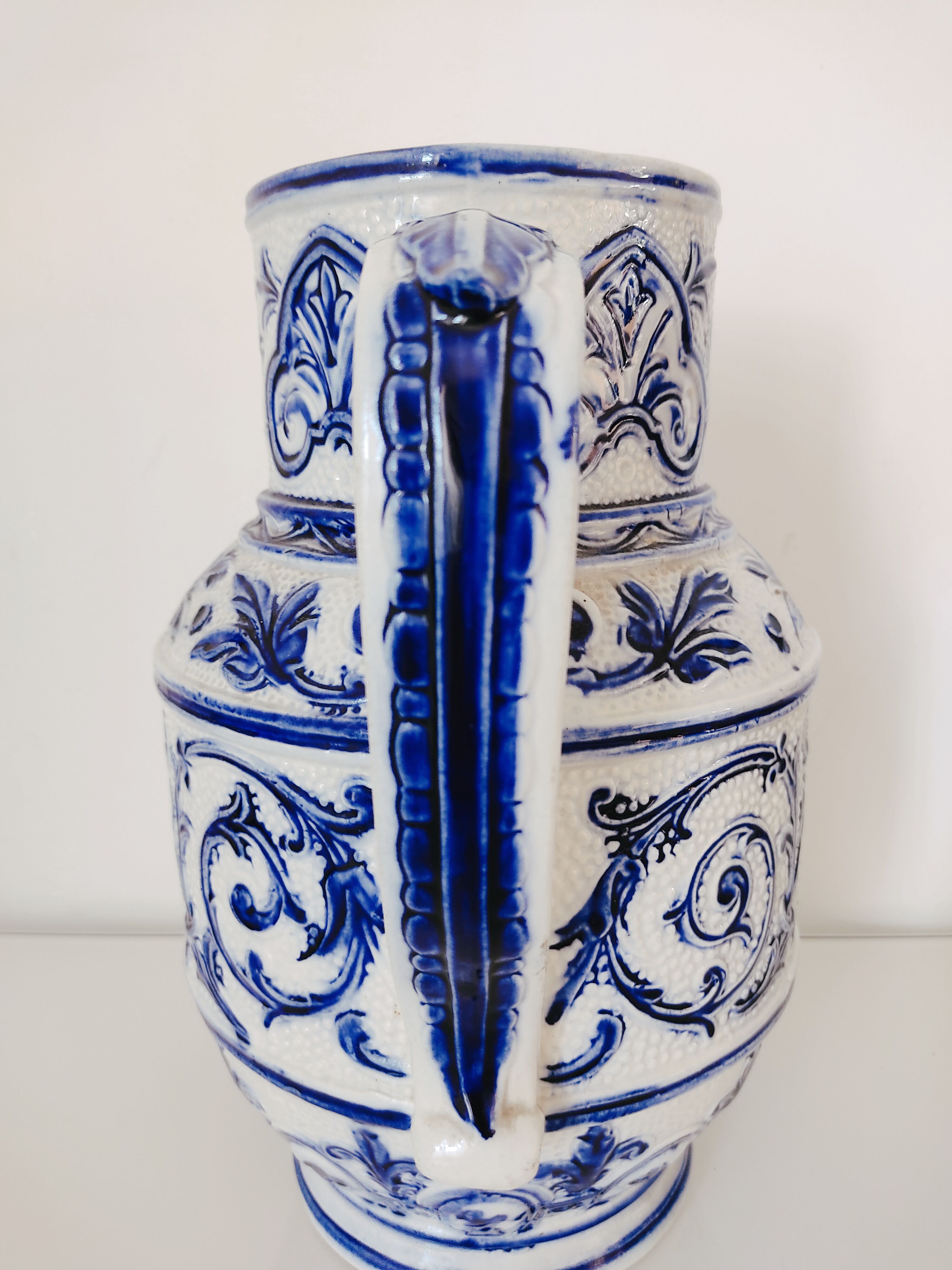 Blue and white pitcher