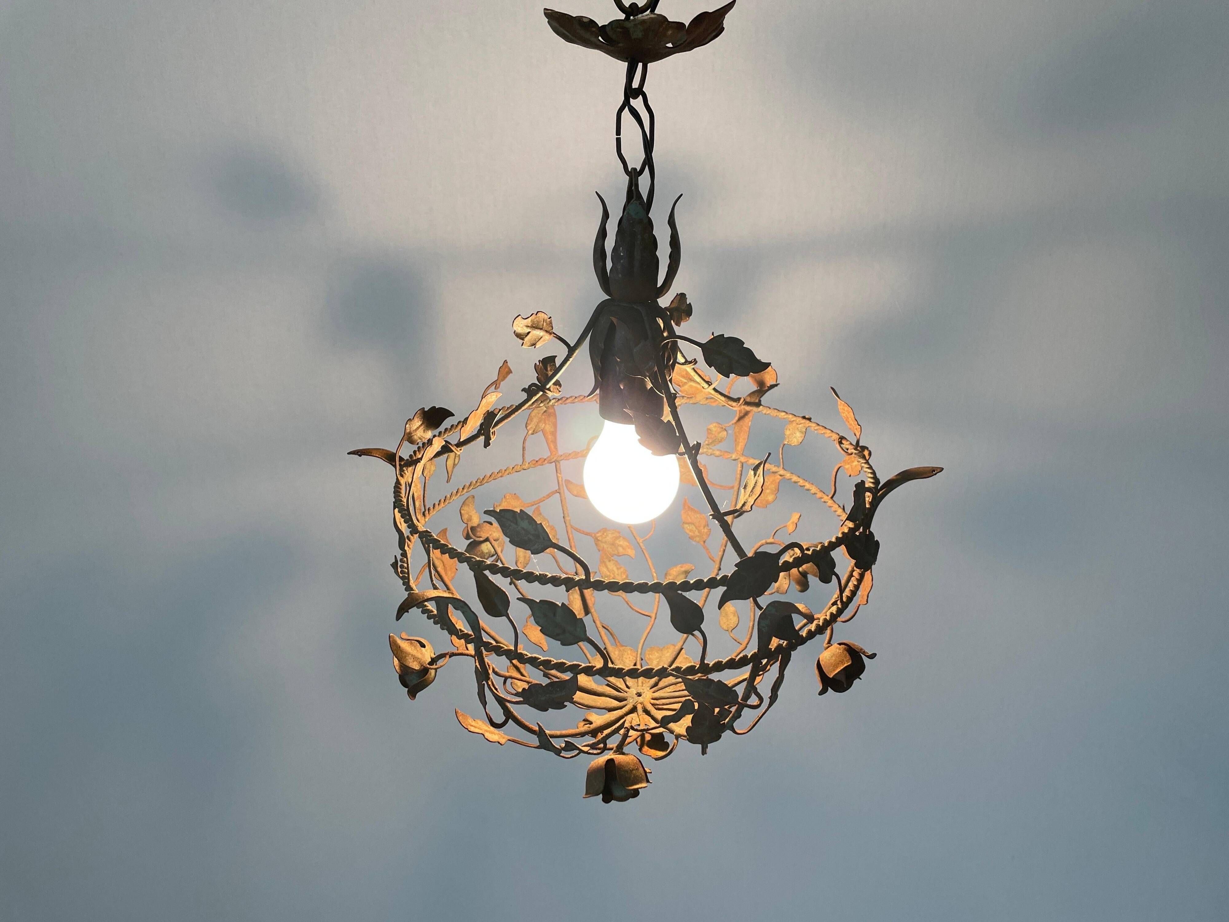 Patinated metal ceiling light with a floral and leaf pattern, 1950s, Italy.
