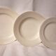 15 white earthenware plates