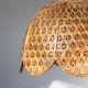 Vintage flower suspension in wicker rattan