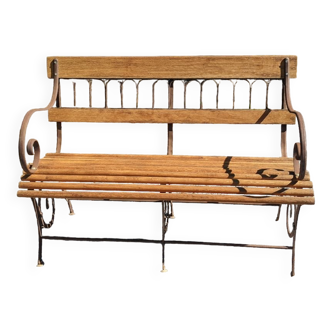 Oak wood and wrought iron garden bench