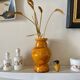 Ochre glazed ceramic vase