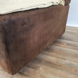Fauteuil avec pouf en cuir et daim