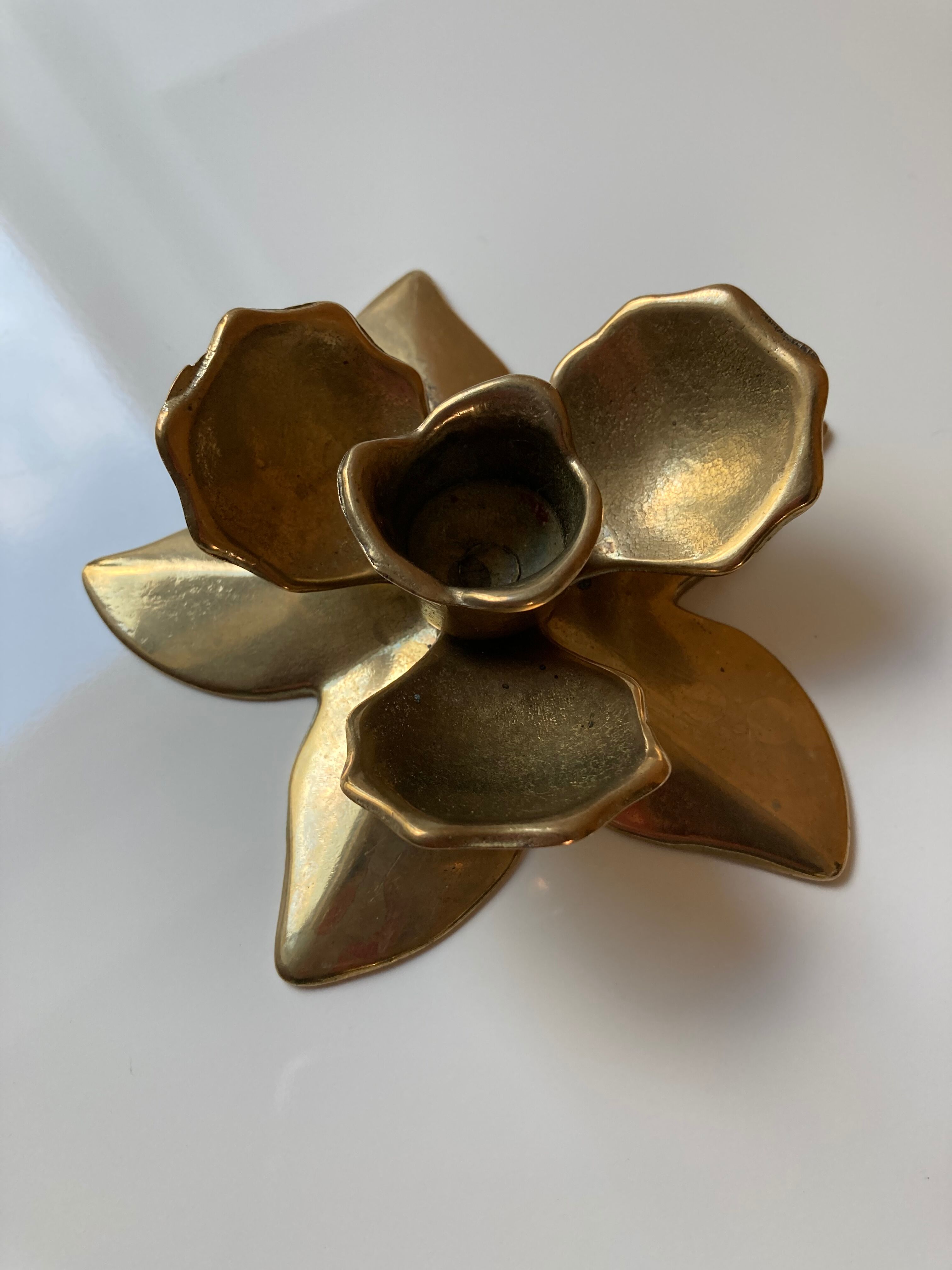 Brass flower candle holder