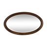 Oval wooden and stucco wall mirror