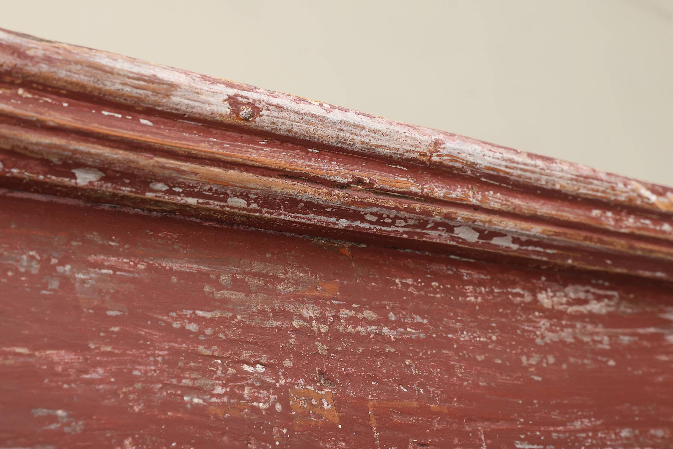 Rustic Parisian cabinet in pine wood with old burgundy paint layers, ca. 18