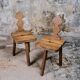 Pair of solid oak Breton chairs in folk art style