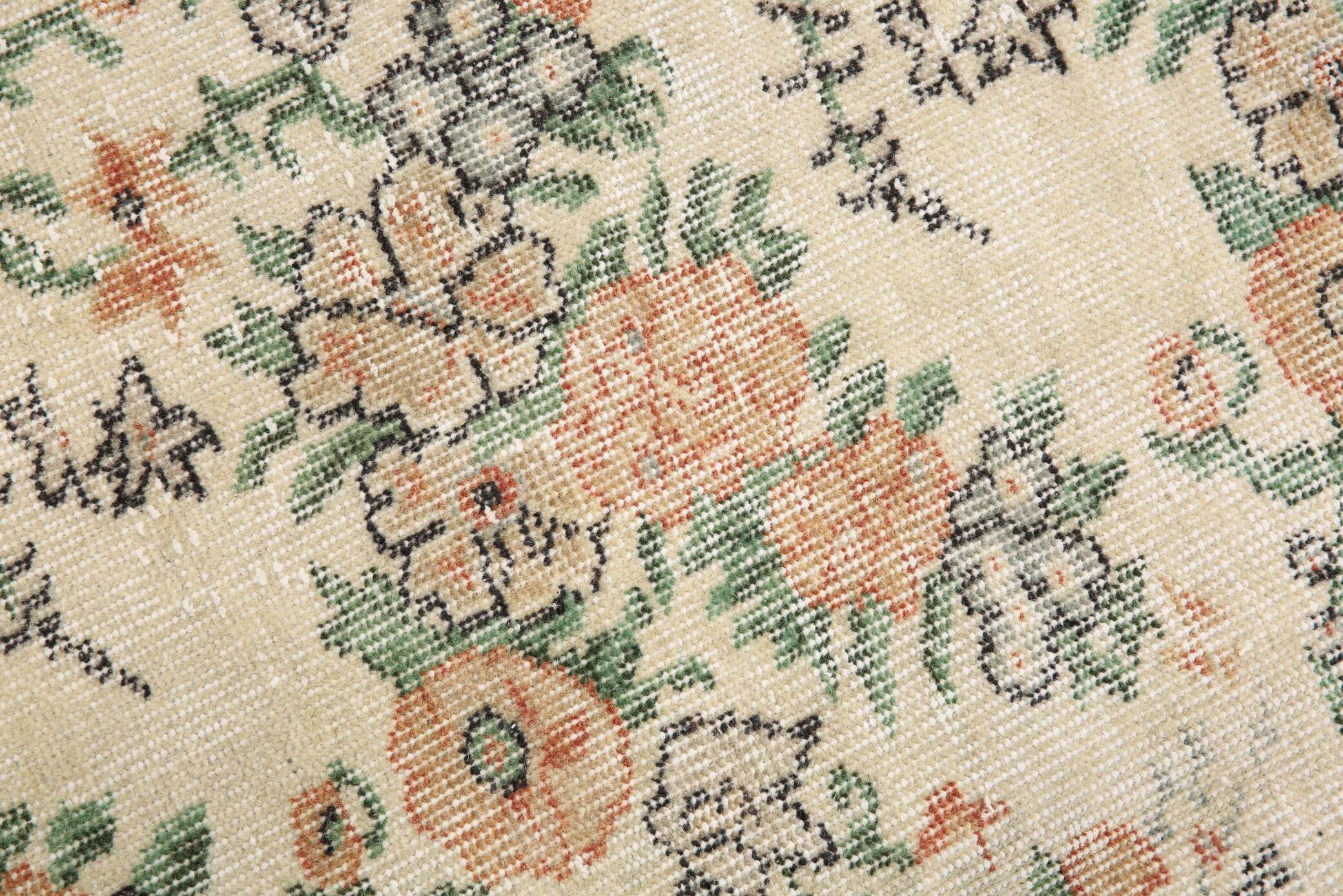 Tapis en laine et coton à décor floral