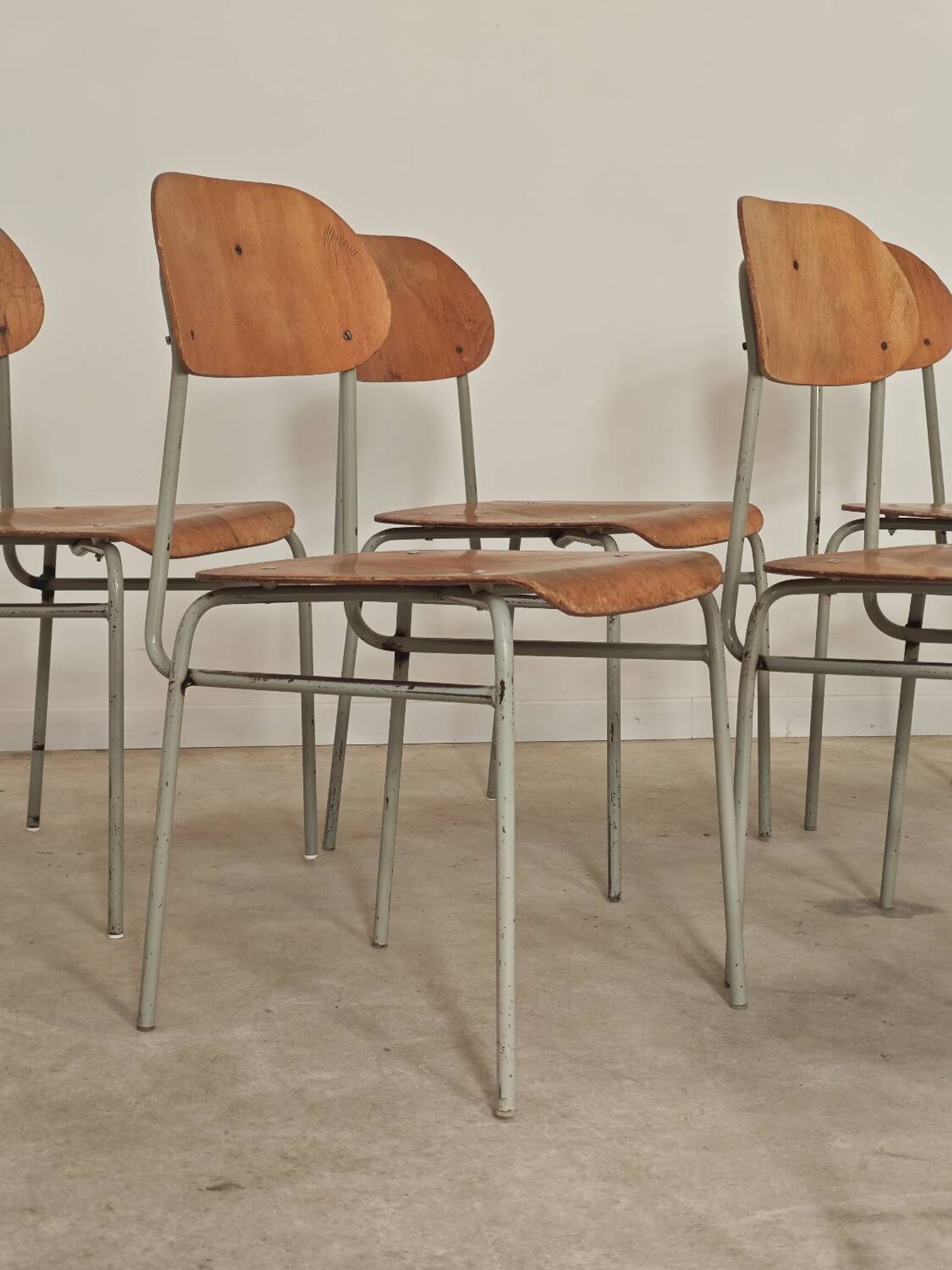 Set of 8 metal and wood school chairs  
Ex Czechoslovakia 1960