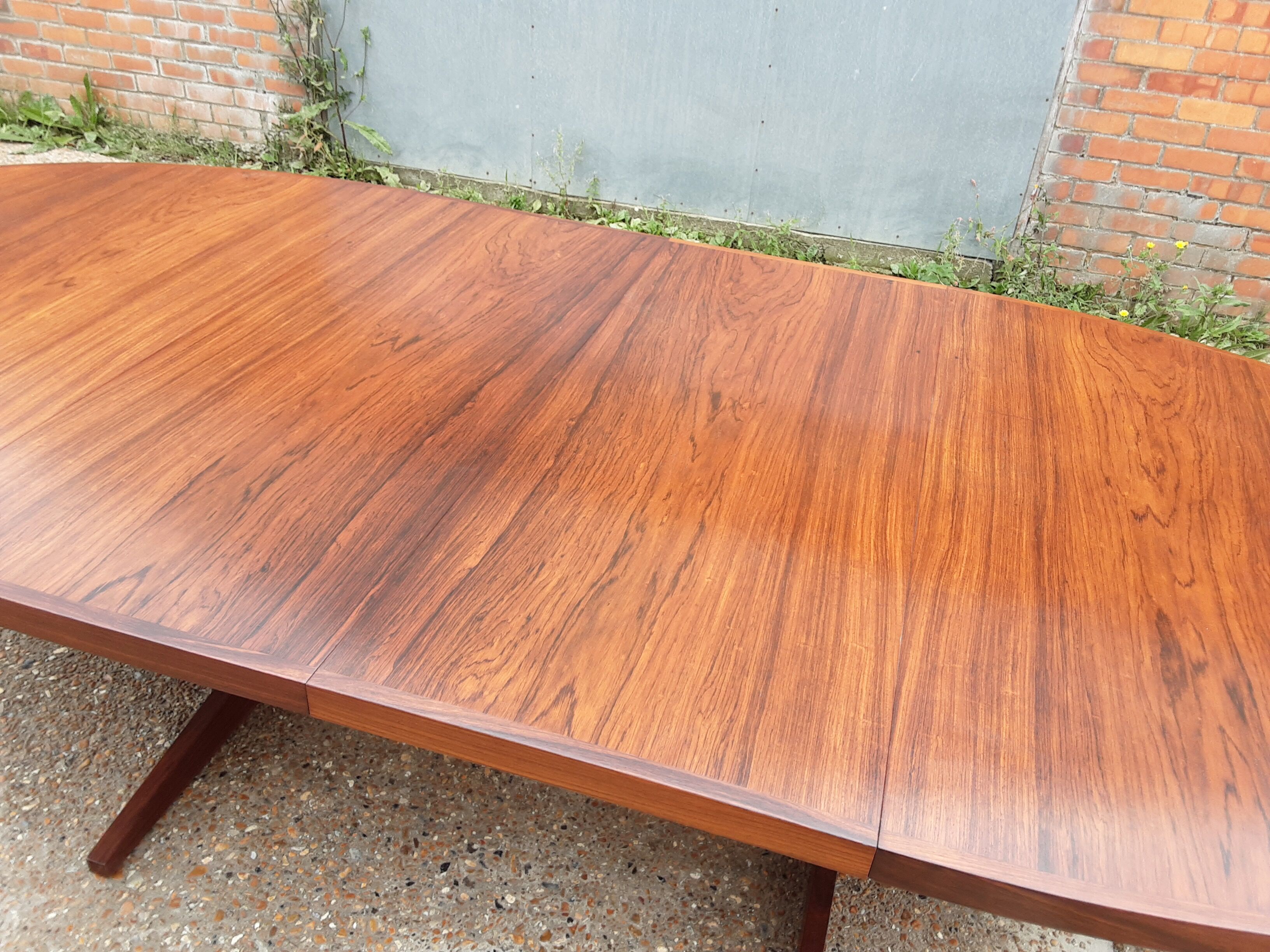 Mid century rosewood extendable dining table by John Mortensen