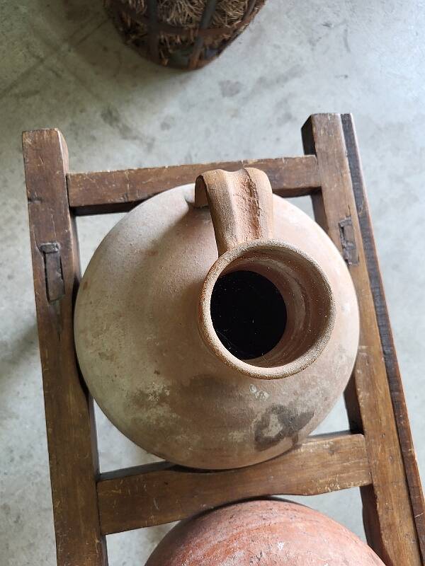 Old wooden jar holder with 3 clay jars